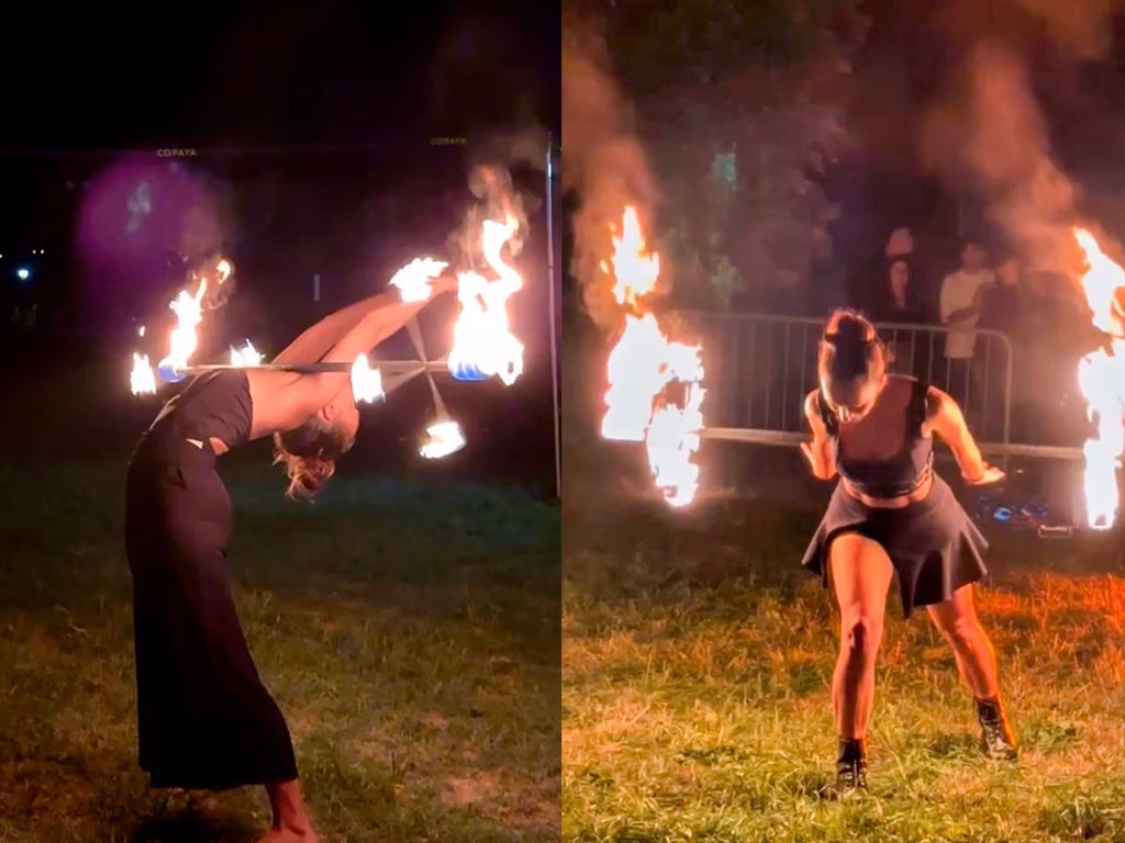 due scene in cui la ragazza artharex utilizza il dragon staff con fuoco durante lo spettacolo fire show